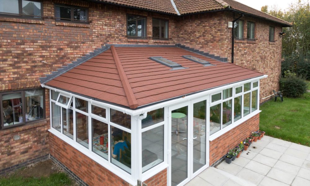 Brown tiled conservatory roof installed by our team in Norwich, Norfolk