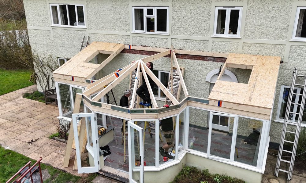 Our team installing a warm conservatory roof in Norwich